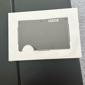 The Ridge wallet with cash strap